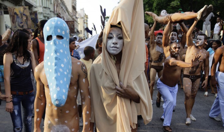 Actors perform during a project organized by Afro-Cuban artist Manuel Mendive ahead of the upcoming 11th Biennial contemporary art festival in Havana May 10, 2012. The project, entitled 